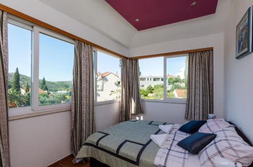 Postel nebo postele na pokoji v ubytování Villa Brasina