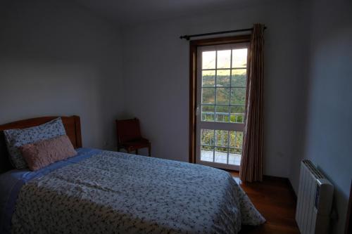 Postel nebo postele na pokoji v ubytování Casa Velha