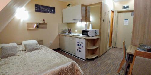 Krevet ili kreveti u jedinici u okviru objekta Elite Apartment Konaci