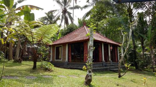 Сад в Tegal Jero Homestay