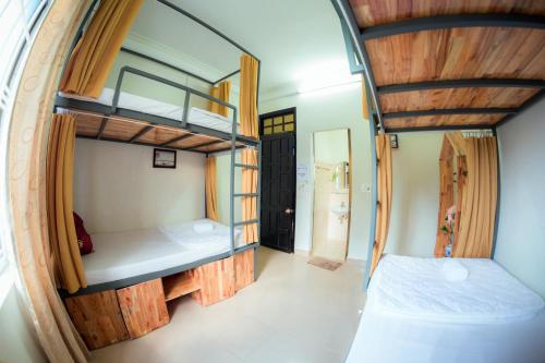 Postel nebo postele na pokoji v ubytování Rubis Hostel