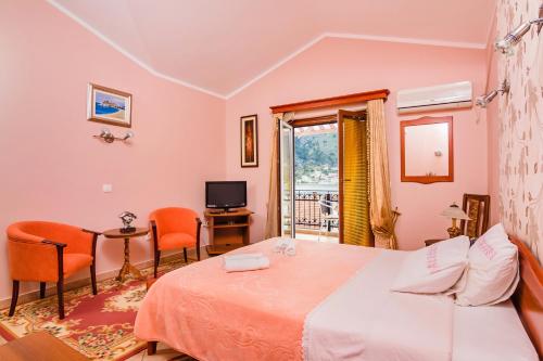 Postel nebo postele na pokoji v ubytování Apartments Bogdanovic