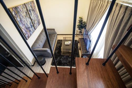 a view from the top of a house with stairs at Amamas Boutique Hotel Kuching in Kuching