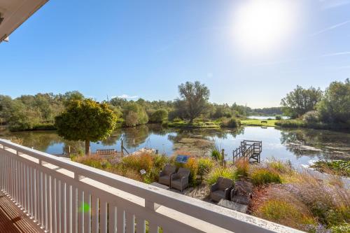a view of a river from a balcony at Hajé Hotel Restaurant de Lepelaar in Lelystad