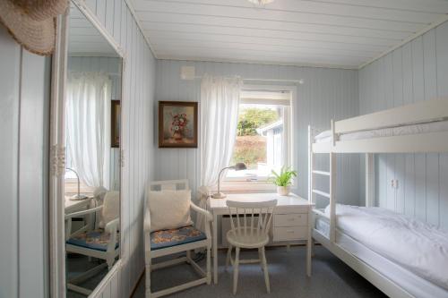 Ένα ή περισσότερα κρεβάτια σε δωμάτιο στο Tønsberg Vandrerhjem