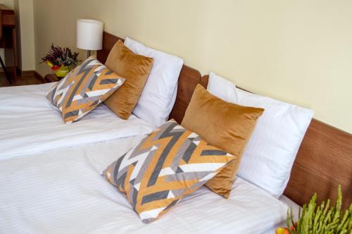 two beds with pillows on top of each other at Centrum Okopowa 55 in Warsaw
