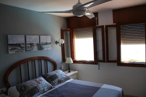 En eller flere senge i et værelse på Bellamar