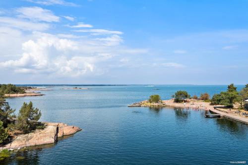 a view of a large body of water with a beach at First Camp Gunnarsö-Oskarshamn in Oskarshamn