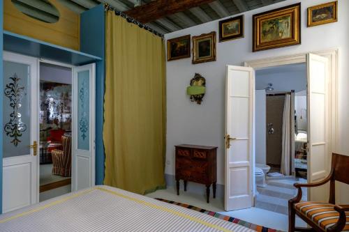 ヴェネツィアにあるCa' del Ramo d'oroのベッド付きの部屋、廊下