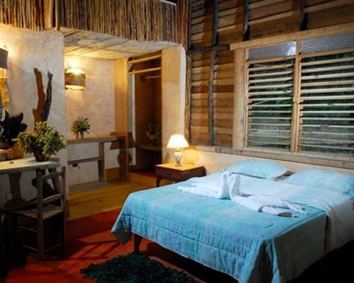 Ein Bett oder Betten in einem Zimmer der Unterkunft Paraiso Caño Hondo