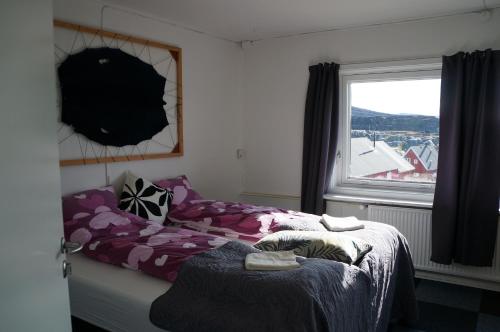 Katil atau katil-katil dalam bilik di Hotel Nordlys