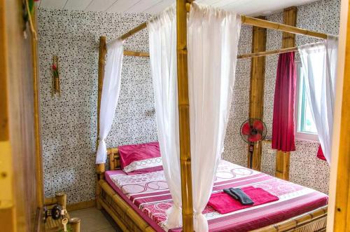 מיטה או מיטות בחדר ב-Czech Beach House Adults Only