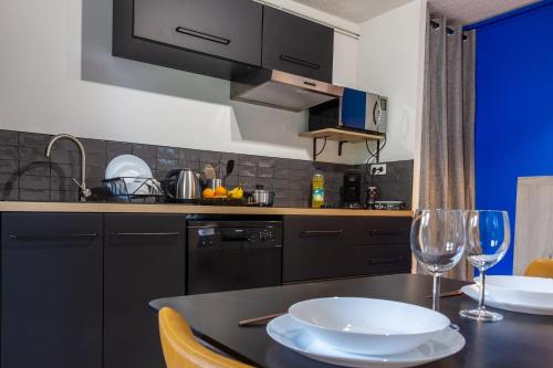 Kuchyň nebo kuchyňský kout v ubytování Appartement ToulouseCityStay Colomiers