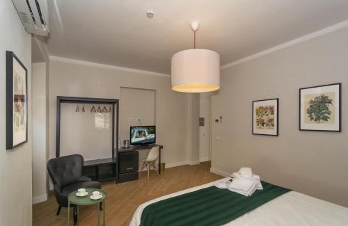 Ein Bett oder Betten in einem Zimmer der Unterkunft Il Giardino Dei Semplici