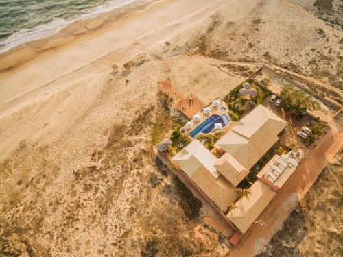 an aerial view of a house on the beach at Bruno Marambaia Charme Hotel in Beberibe