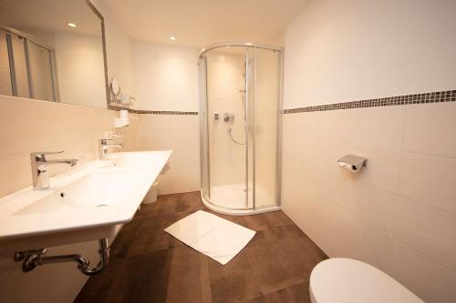 Un baño de Hotel Appart Peter