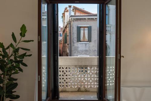 a view from the window of a building at Palazzo Vendramin Costa in Venice