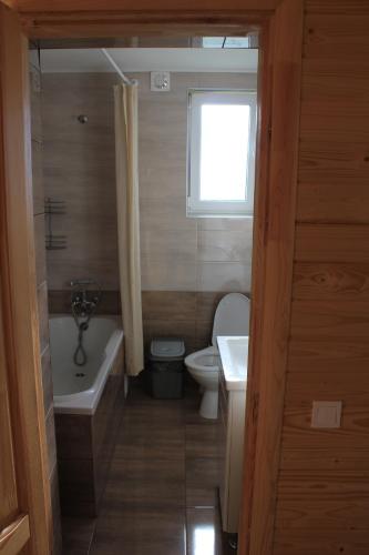 Koupelna v ubytování Котедж Mountain house