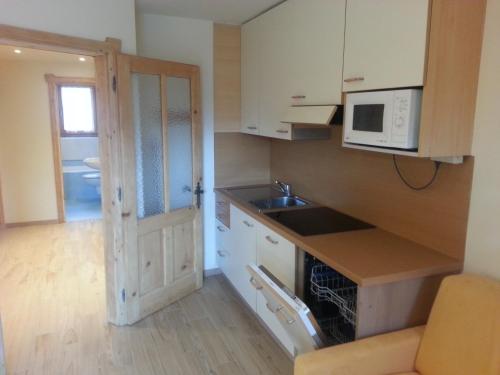 Cuisine ou kitchenette dans l'établissement Chalet Del Sole per gruppi
