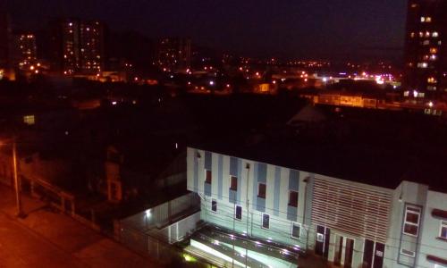 a view of a city at night with a building at depto nuevo temuco in Temuco