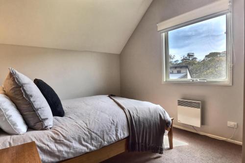 Ein Bett oder Betten in einem Zimmer der Unterkunft Ski Bird