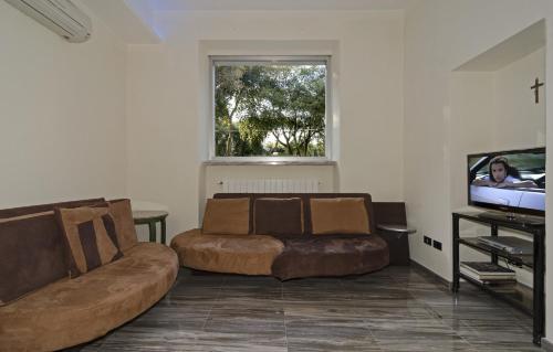 Χώρος καθιστικού στο Hotel Roma