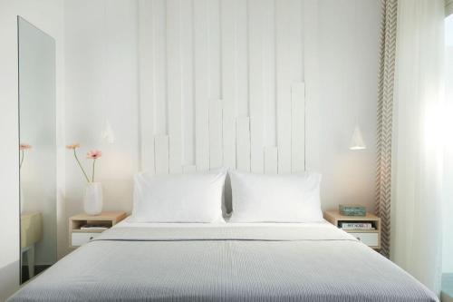 Ein Bett oder Betten in einem Zimmer der Unterkunft Hotel Alkyonis