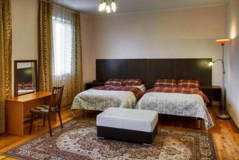 Кровать или кровати в номере Guest House on Sadovaya