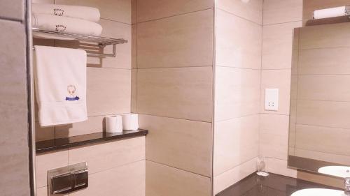 Koupelna v ubytování Merica Hotel