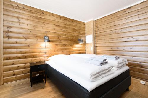 Säng eller sängar i ett rum på Blefjell Lodge