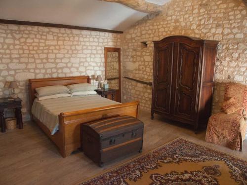 מיטה או מיטות בחדר ב-Gîte Pays de la Loire