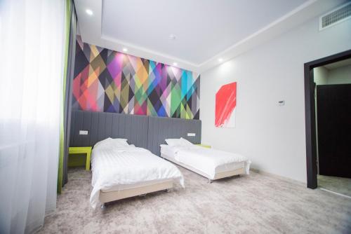 Postel nebo postele na pokoji v ubytování Aсe Hotel