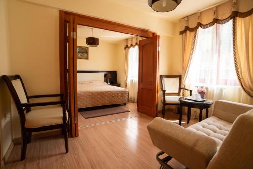 מיטה או מיטות בחדר ב-Csillag Panzio