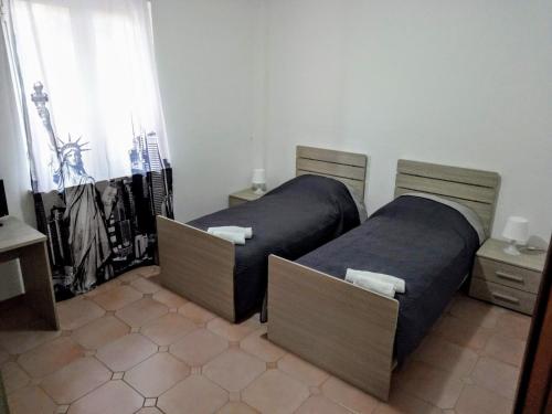 Postel nebo postele na pokoji v ubytování B&B MIke