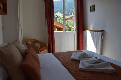 Postel nebo postele na pokoji v ubytování Hotel Sylvana