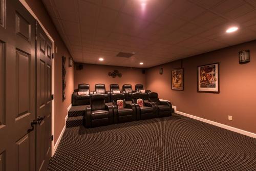 a waiting room with leather chairs in a corridor at The Pointe in Greensboro