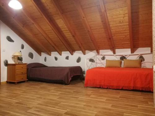 A bed or beds in a room at Casa Naranjo