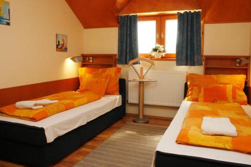 Postel nebo postele na pokoji v ubytování Motel 60