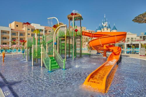 a water park with slides in the water at Bahia Principe Fantasia Tenerife - All Inclusive in San Miguel de Abona