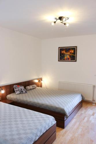 Ліжко або ліжка в номері DM apartment