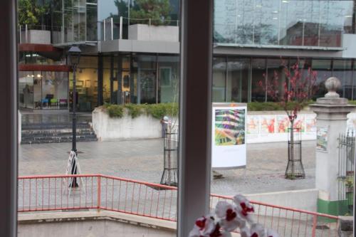 a window with a view of a city street at Apartment Na skali in Kranj