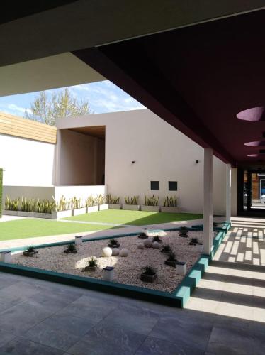 an external view of a house with a garden at garden33 in Chivilcoy