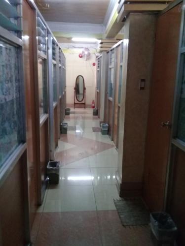 a hallway of a building with a hallwayngth at ASHBURN'S TRANSIENT BAGUIO - 3rd to 5th floor BASIC SLEEP and GO Accommodation, WITH PARKING, NO ELEVATOR in Baguio