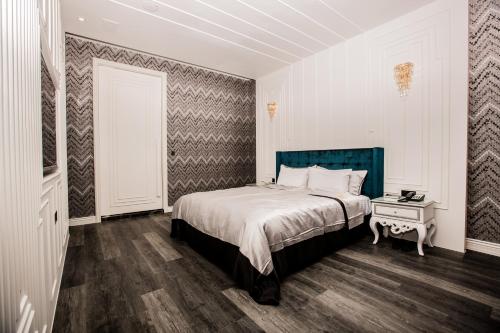 Ένα ή περισσότερα κρεβάτια σε δωμάτιο στο Kumotsuki Motel