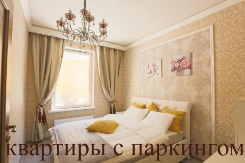 Tempat tidur dalam kamar di Complex Apartments near Novodevichiy