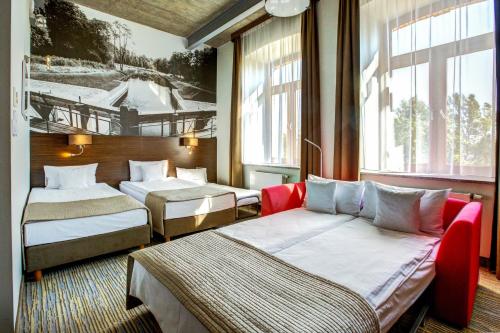 Postel nebo postele na pokoji v ubytování Hotel Loft 1898