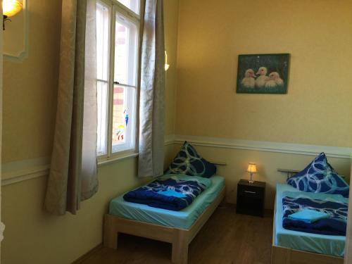 Postel nebo postele na pokoji v ubytování Monteur-Zimmer Dresden, Bad-Miniküche, 24-7 Self Check In