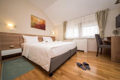 Hotel Monsにあるベッド