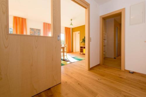 an empty room with a door and a hallway at Naturgut Gailtal in Sankt Stefan an der Gail