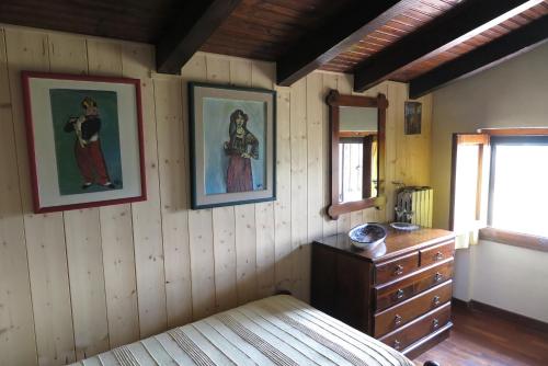 En eller flere senge i et værelse på Casa Fernanda